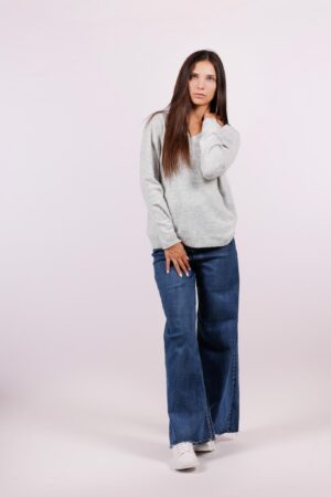 MAGLIA a manica lunga con scollo a V e orli a costine