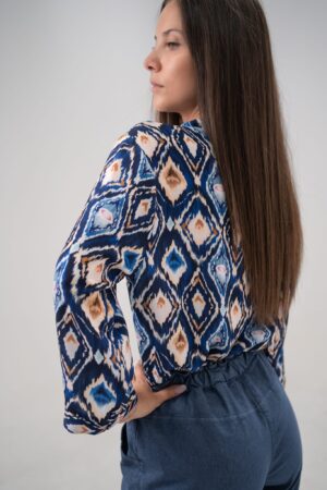 BLUSA in denim con legaccio in vita e risvolti