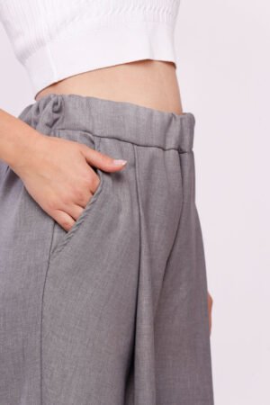 PANTALONE elegante a palazzo con pieghe e cuciture esterne