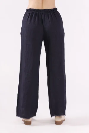 PANTALONE a palazzo in fresco lino con frange alle caviglie