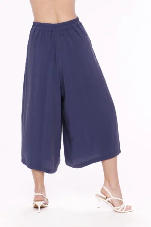 PANTALONE leggero a palazzo con pieghe asimmetriche