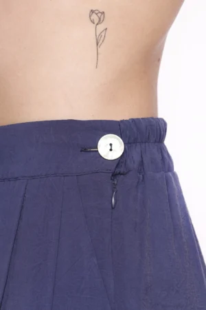 PANTALONE leggero a palazzo con pieghe asimmetriche