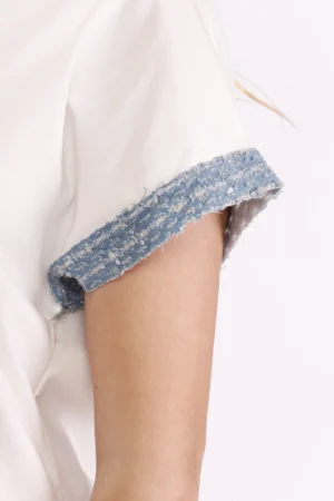 T-SHIRT ampia con orlo a sbuffo collo a giro e orli della manica corta in grazioso tessuto glitterato
