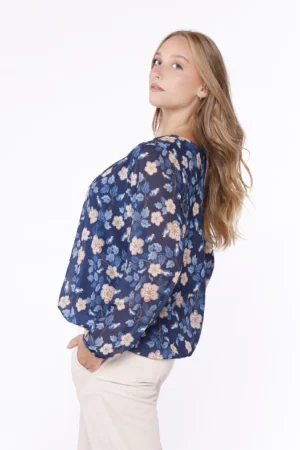 BLUSA a fantasia di fiori con scollo a giro e orli a sbuffo