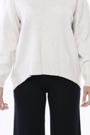 MAGLIA a collo alto con orli a costine e manica ampia