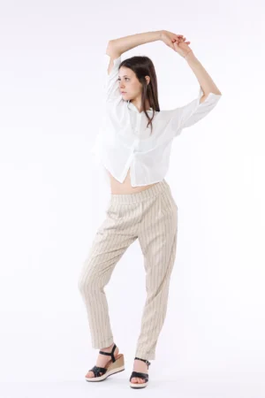 PANTALONE a righe con risvolti alle caviglie e taschine laterali