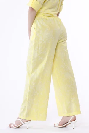 PANTALONE a palazzo con ricami in rilevo e nodo in vita