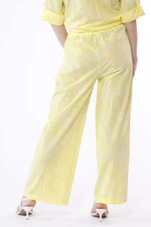 PANTALONE a palazzo con ricami in rilevo e nodo in vita