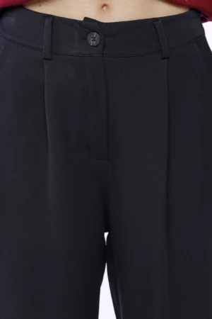 PANTALONE a zampa larga con tasche bottone di chiusura e passanti alla cintura