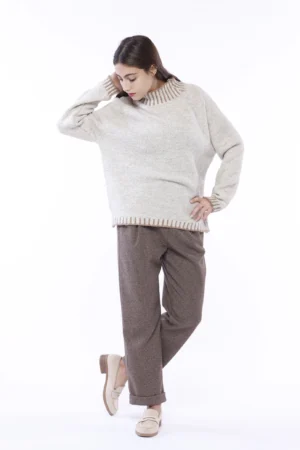 PANTALONE con trama a quadretti risvolti di tendenza alle caviglie e tasche laterali