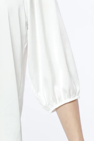 BLUSA versatile con maniche a sbuffo e scollo a giro