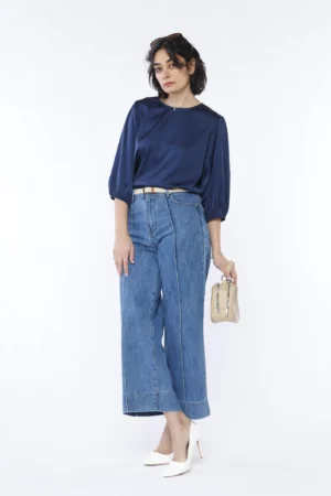 BLUSA versatile con maniche a sbuffo e scollo a giro
