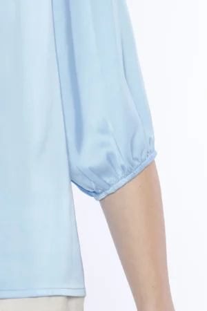 BLUSA versatile con maniche a sbuffo e scollo a giro